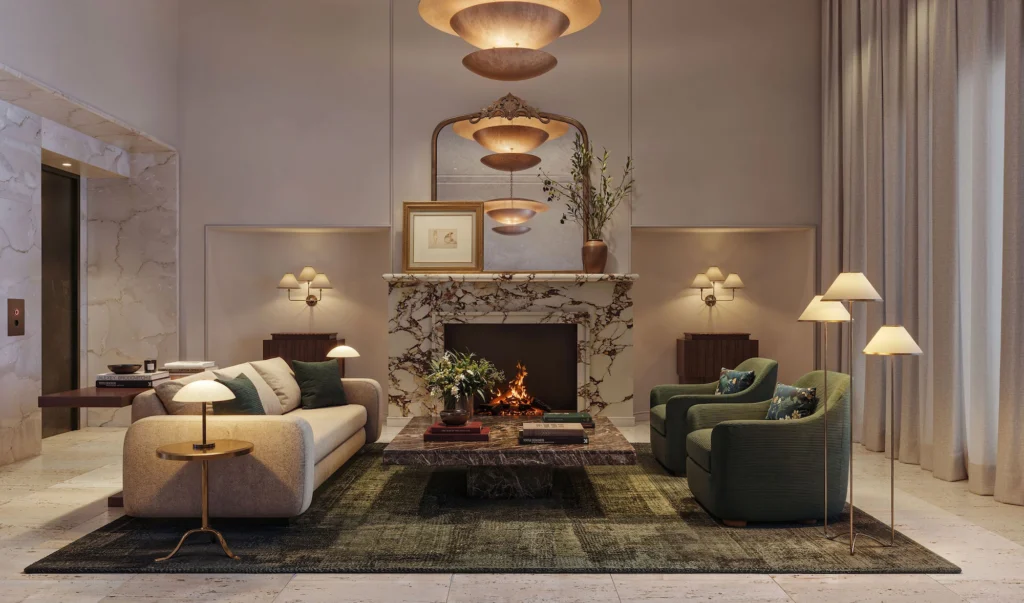 Modern residents' lounge at Pendry Residences Nashville with a marble fireplace and plush seating.